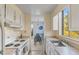 View of kitchen and dining area, showcasing an open floor plan at 909 N Lafayette St # 402, Denver, CO 80218