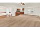 Spacious living room with neutral carpet and open layout at 9140 Fontaine St, Denver, CO 80260