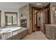 Spa-like bathroom with soaking tub and fireplace at 45 Kerrigan Ct, Breckenridge, CO 80424