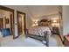 Bright bedroom with a full-size bed and access to a bathroom at 45 Kerrigan Ct, Breckenridge, CO 80424