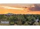 Mountain views from a community lot with stunning sunset views at 6521 S Harlan Ct, Littleton, CO 80123
