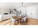 Bright dining area with hardwood floors and kitchen access at 1330 W 35Th Ave, Denver, CO 80211