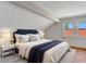 Spacious bedroom with hardwood floors and a new bed at 155 N Downing St, Denver, CO 80218