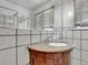Bathroom with granite vanity and tiled walls at 155 N Downing St, Denver, CO 80218