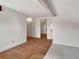 Large bedroom with hardwood floors and an additional room at 155 N Downing St, Denver, CO 80218