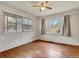 Bright bedroom with hardwood floors and window coverings at 155 N Downing St, Denver, CO 80218