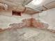 Unfinished basement with exposed brick walls at 155 N Downing St, Denver, CO 80218