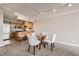 Dining area with glass table and chairs near kitchen at 1850 Folsom St # 402, Boulder, CO 80302