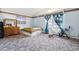 Bedroom with carpeted floor and large dresser at 1340 Xanthia St, Denver, CO 80220