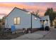 Side view of home showcasing backyard and landscaping at 1340 Xanthia St, Denver, CO 80220