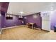 Spacious basement recreation area with tile flooring at 1340 Xanthia St, Denver, CO 80220