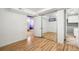 Finished basement area with mirrored closet at 1340 Xanthia St, Denver, CO 80220