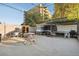 Large concrete backyard with patio cover at 1340 Xanthia St, Denver, CO 80220