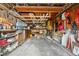 Full garage with ample storage shelving at 1340 Xanthia St, Denver, CO 80220