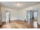 Living room with hardwood floors and views to kitchen and other rooms at 3637 Lowell Blvd, Denver, CO 80211