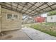 Covered patio with concrete flooring and backyard access at 3637 Lowell Blvd, Denver, CO 80211