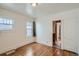 Bright bedroom with hardwood floors and access to bath at 3637 Lowell Blvd, Denver, CO 80211