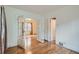 Hardwood floor hallway with access to other rooms at 3637 Lowell Blvd, Denver, CO 80211