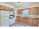 Classic kitchen with wood cabinets and appliances at 3637 Lowell Blvd, Denver, CO 80211