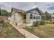 Charming bungalow with a newly landscaped front yard at 3637 Lowell Blvd, Denver, CO 80211
