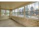 Bright sunroom with multiple windows and brick walls at 3637 Lowell Blvd, Denver, CO 80211