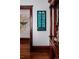 Formal dining area showcasing a vintage hutch and artistic wall decor at 836 E 17Th Ave # 2E, Denver, CO 80218