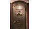 Ornate vintage vault door with decorative painting and gold detailing at 836 E 17Th Ave # 2E, Denver, CO 80218