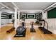Well-equipped fitness center with various cardio and strength training machines at 836 E 17Th Ave # 2E, Denver, CO 80218