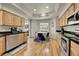 Kitchen with granite countertops, wood cabinets, and breakfast nook at 11770 Leavenworth Dr, Conifer, CO 80433