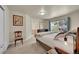 Spacious main bedroom with a king-size bed and en-suite bathroom at 11770 Leavenworth Dr, Conifer, CO 80433