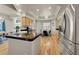 Kitchen with granite countertops and light wood cabinets at 11770 Leavenworth Dr, Conifer, CO 80433