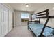 Bedroom with a bunk bed, dresser and mountain views at 11770 Leavenworth Dr, Conifer, CO 80433