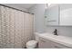 Bathroom with updated vanity and shower/tub combo at 5775 W Atlantic Pl # 303, Lakewood, CO 80227