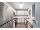 Kitchen with stainless steel appliances and granite countertops at 5775 W Atlantic Pl # 303, Lakewood, CO 80227