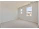 Spacious bedroom with two large windows and neutral decor at 11077 Star Fall St, Littleton, CO 80125