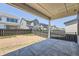 Covered patio overlooking a fenced backyard at 11077 Star Fall St, Littleton, CO 80125