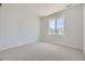 Bright bedroom with neutral walls and carpet at 11077 Star Fall St, Littleton, CO 80125