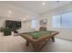 Finished basement with a pool table and plenty of space for entertainment at 11077 Star Fall St, Littleton, CO 80125
