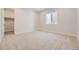 Bright bedroom with a closet and neutral carpeting at 11077 Star Fall St, Littleton, CO 80125