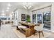 Elegant dining room with wooden table and access to a patio at 7038 Homeplace St, Castle Rock, CO 80108