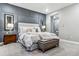 Luxurious main bedroom with en-suite bathroom access at 7038 Homeplace St, Castle Rock, CO 80108