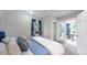 Bedroom with a queen bed and access to a sunroom at 1137 Colorado Blvd, Denver, CO 80206