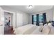 Well-lit bedroom with hardwood floors and neutral walls at 1137 Colorado Blvd, Denver, CO 80206