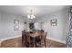 Spacious dining room with hardwood floors and decorative art at 1137 Colorado Blvd, Denver, CO 80206