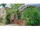 Charming brick home with a pergola and lush greenery at 1137 Colorado Blvd, Denver, CO 80206