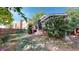 House exterior with mature trees and a well-maintained yard at 1137 Colorado Blvd, Denver, CO 80206
