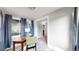Sunlit home office with view into adjacent living area at 1137 Colorado Blvd, Denver, CO 80206