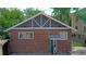 Rear view of brick home featuring a private entrance at 1137 Colorado Blvd, Denver, CO 80206