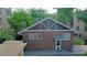 Brick house exterior with backyard and detached structure at 1137 Colorado Blvd, Denver, CO 80206
