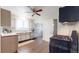 Kitchen features stainless steel appliances and wood flooring at 1137 Colorado Blvd, Denver, CO 80206